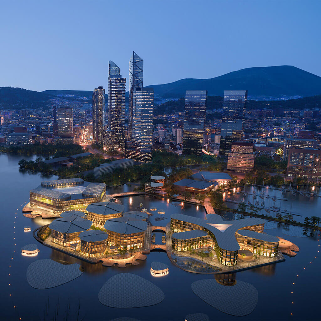 Vista esterna di OCEANIX Busan con le piattaforme galleggianti e la città sullo sfondo.